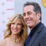 Jerry Seinfeld, right, the writer/director/star of "Unfrosted," poses with his wife Jessica at the premiere of the Netflix film at the Egyptian Theatre, Tuesday, April 30, 2024, in Los Angeles. (AP Photo/Chris Pizzello)