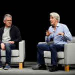Craig Federighi, right, Apple's senior vice president of software engineering, and John Giannandrea, senior vice president of machine learning and AI strategy, participate in a discussion at an Apple event in Cupertino, Calif., Monday, June 10, 2024. (AP Photo/Jeff Chiu) Apple AI